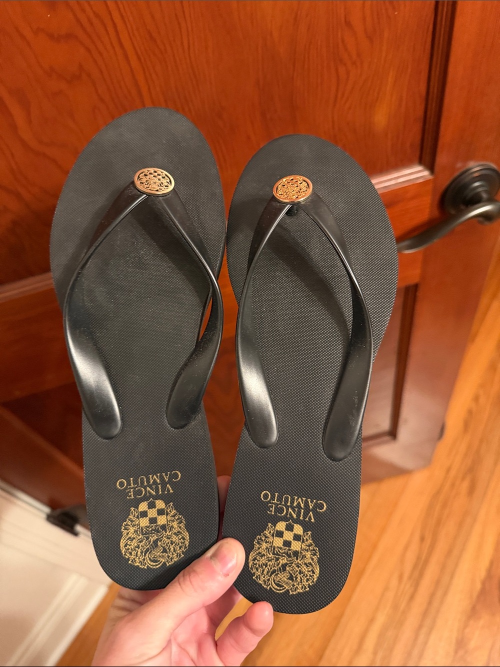 Vince Camuto Black Flip Flop Sandals with Gold Medallion